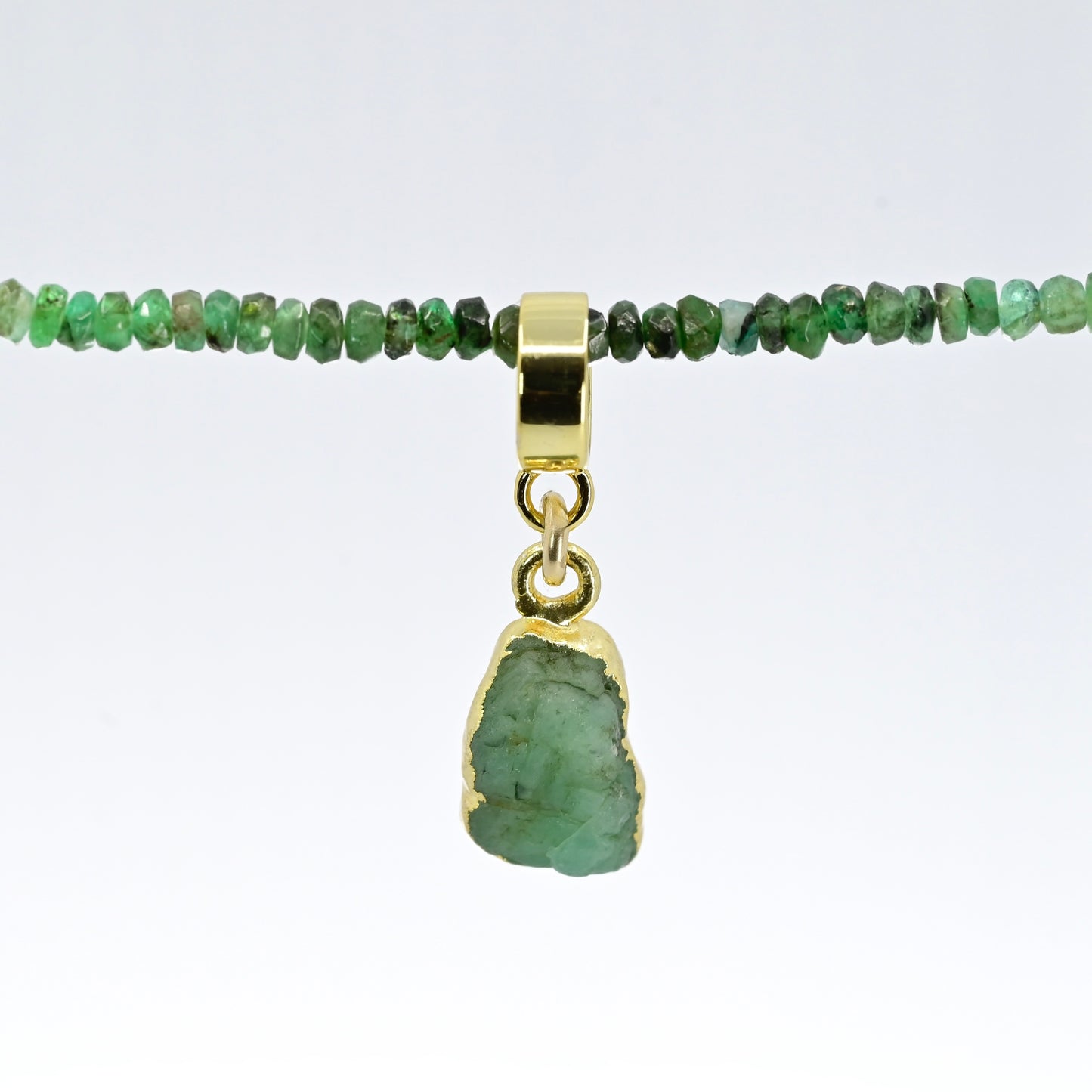 TINY EMERALD & GOLD