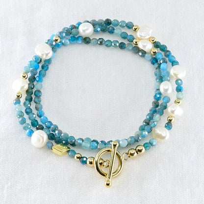 Multistrand beaded bracelet with pearls and gold accents
