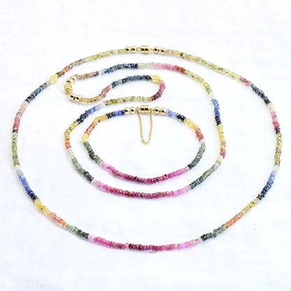 Multicolored beaded necklace on a white background