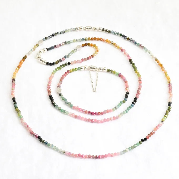 Multicolored beaded necklace on a white background