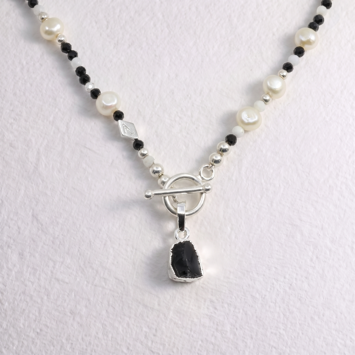 BLACK SPINEL- clip on pendant