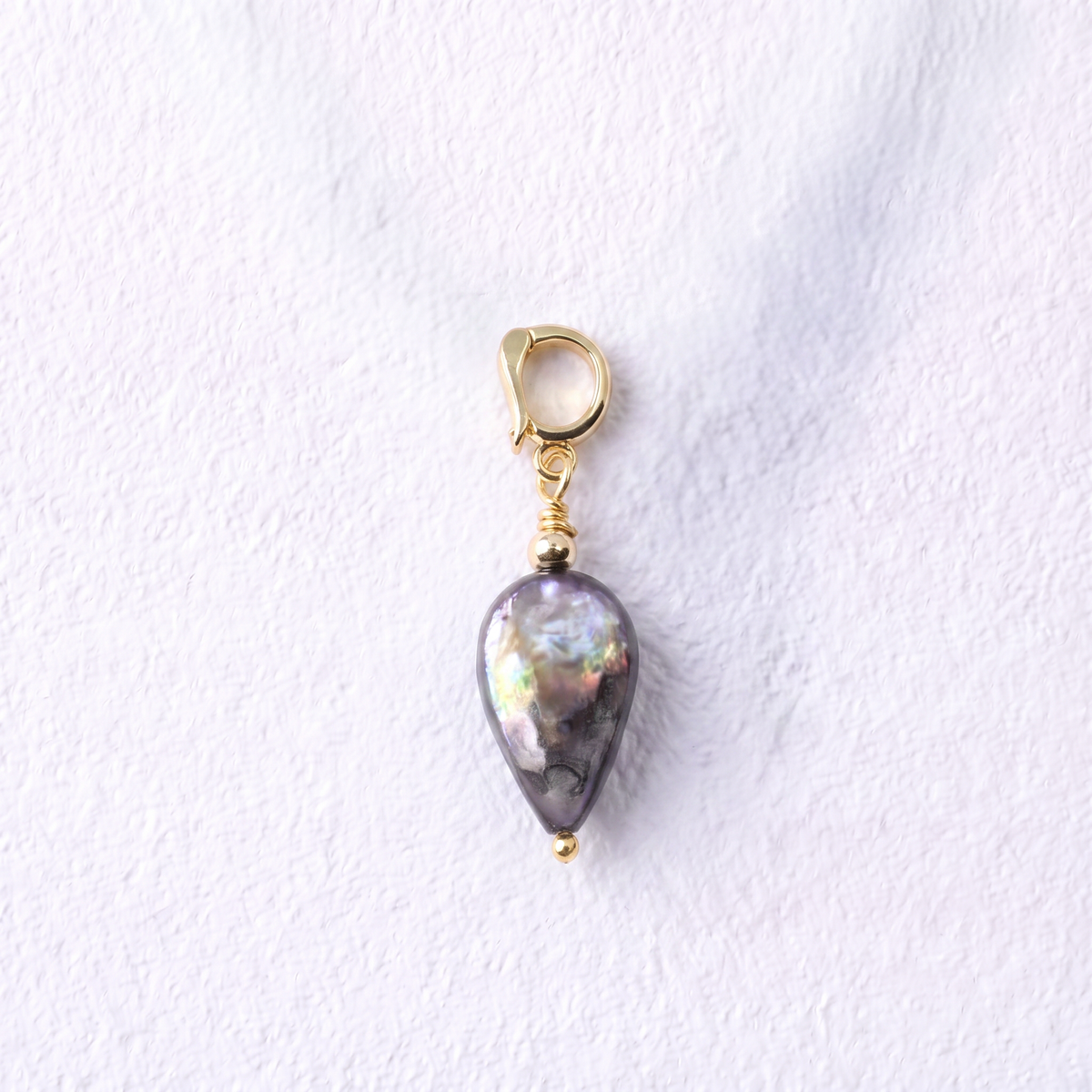 DROPLET - flat droplet shaped peacock freshwater pearl & gold plate clip on pendant