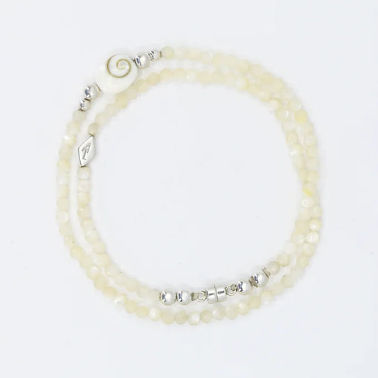 Two pearl necklaces with silver accents on a white background